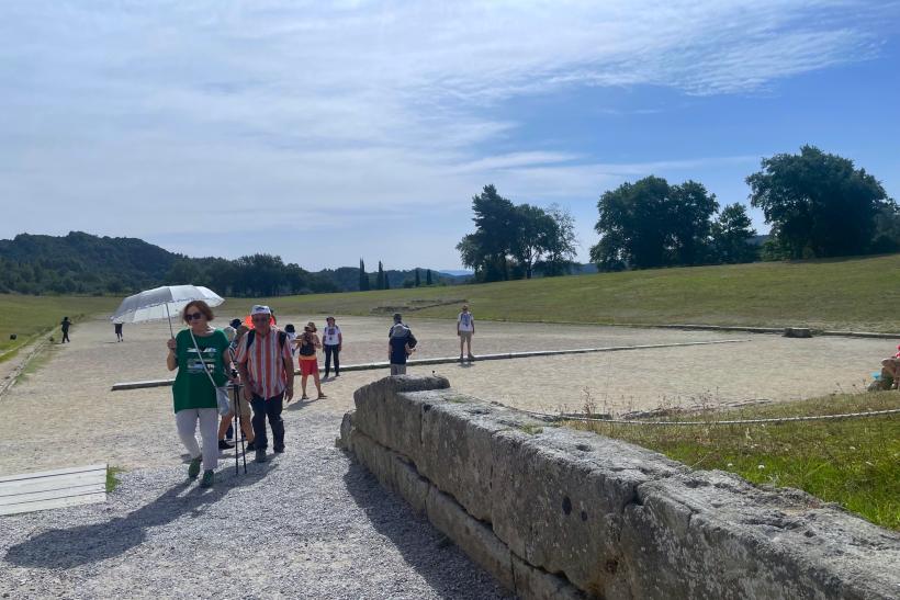 Štadión v Olympii a návštevníci.